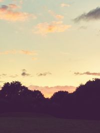 Scenic view of landscape against sky at sunset