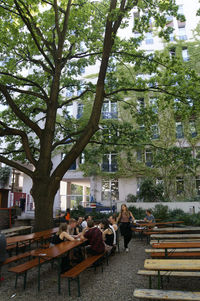 People walking on table in city