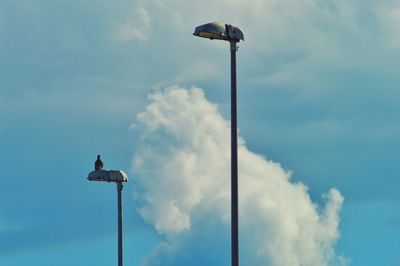 Low angle view of street light against sky