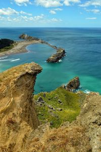 Scenic view of sea against cloudy sky