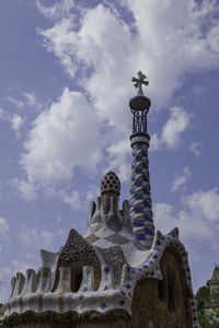 Low angle view of temple against building in parc güell