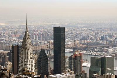 Modern buildings in city against sky