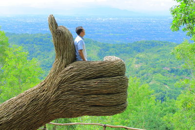 Rear view of people on land