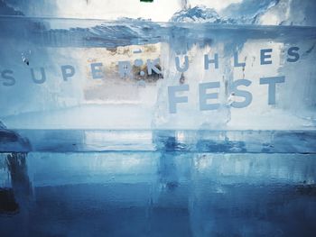 Reflection of building on frozen water