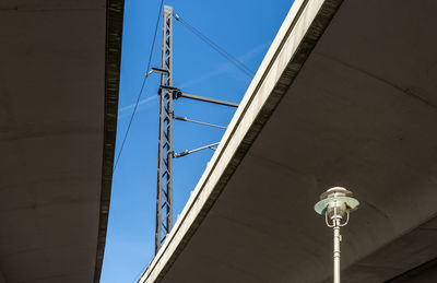 Low angle view of street light against sky