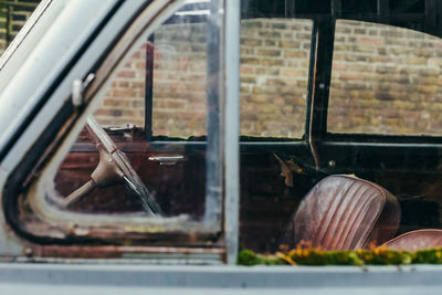 Close-up of glass window of car