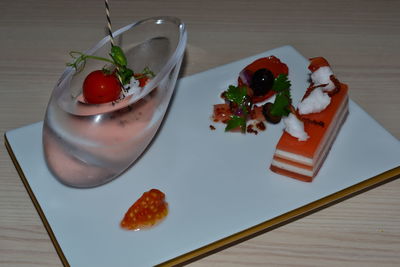 High angle view of fruits in plate on table