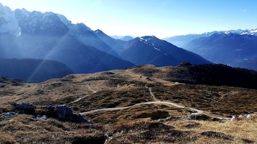 Scenic view of mountains against sky during winter