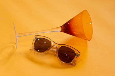 Close-up of sunglasses against white background