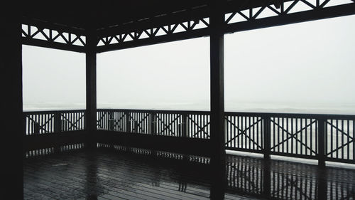 Bridge over sea against sky