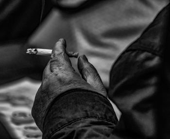 Close-up of man smoking cigarette