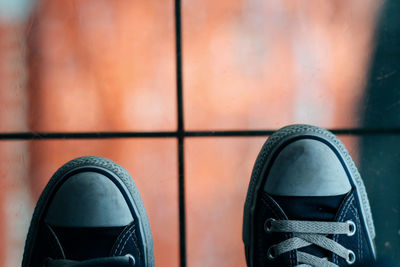 Low section of man standing outdoors