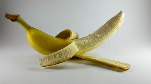 Close-up of banana against white background