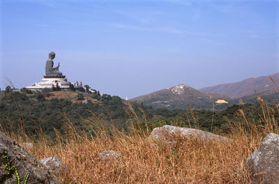 Buddha statue on hill at po lin monastery