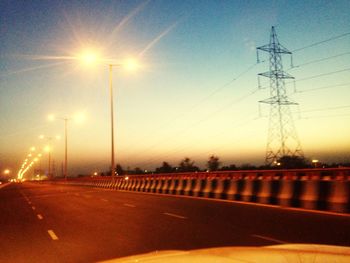 Road against sky at sunset