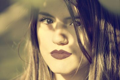 Close-up portrait of young woman