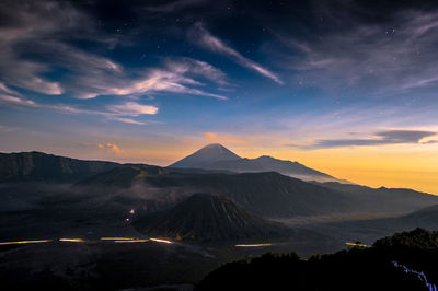 Scenic view of dramatic sky over landscape