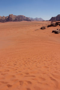 Scenic view of desert against clear sky