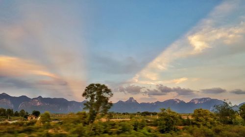 Scenic view of landscape against sky during sunset