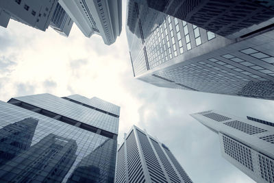 Low angle view of modern buildings against sky