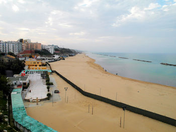 High angle view of sea against cloudy sky