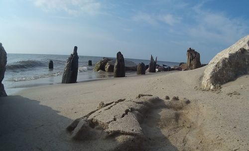 Scenic view of beach against sky