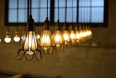 Close-up of hanging light bulbs