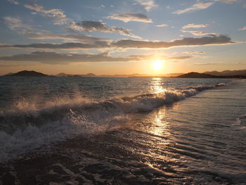 Scenic view of sea against sky during sunset