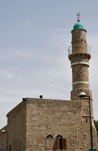 Low angle view of historic building against sky