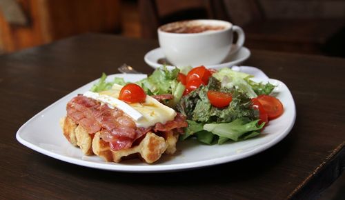 Close-up of breakfast served on table