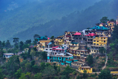 High angle view of houses and buildings in city