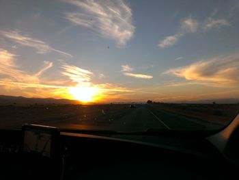 Scenic view of landscape at sunset