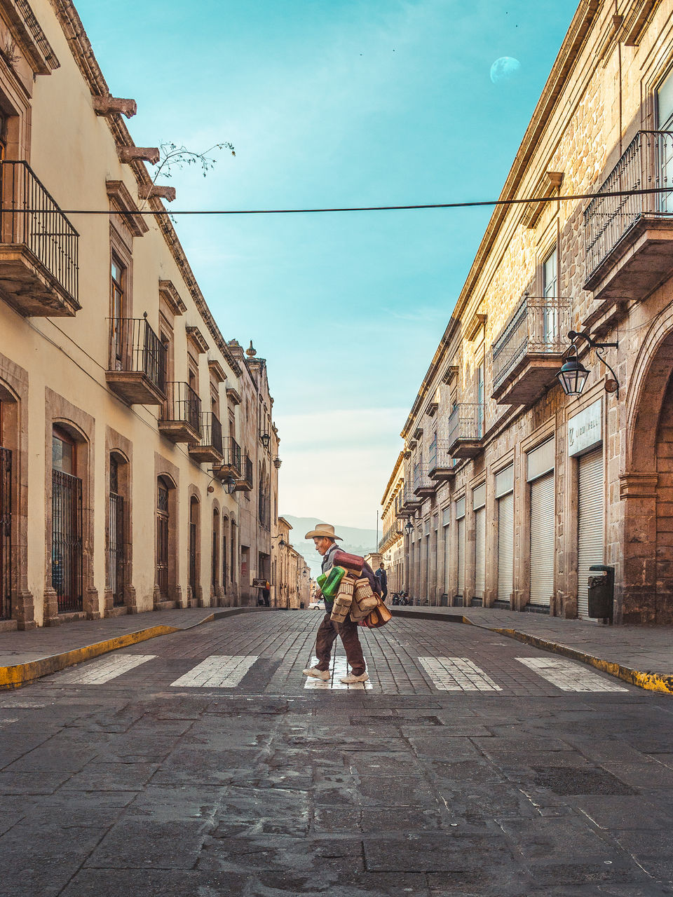 MAN WALKING ON STREET