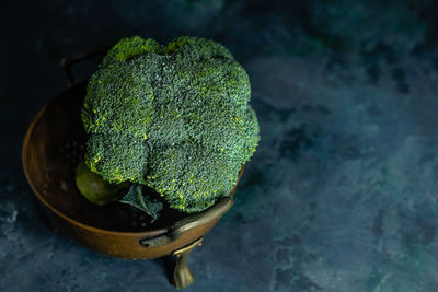 High angle view of broccoli in bowl on table