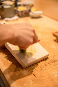 Chef grating fresh wasabi