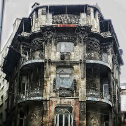 Low angle view of old building in city