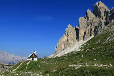 Dolomites landscape and the chapel of the alpine troops in the tre cime di lavaredo natural park.