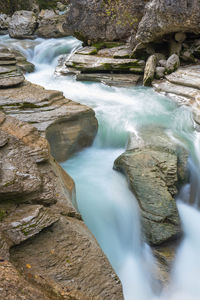 Scenic view of waterfall in forest