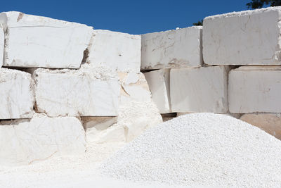 Stack of white wall against sky