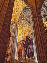 Low angle view of ornate ceiling of building