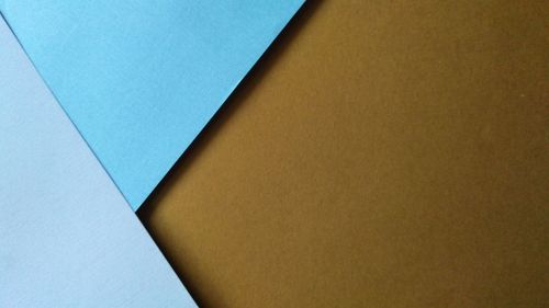 Close-up of building against blue sky