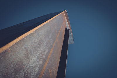 Low angle view of built structure against clear blue sky