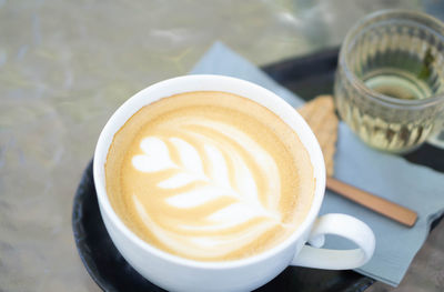 High angle view of cappuccino on table