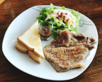 Close-up of breakfast served in plate