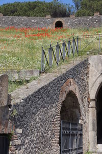 Arch bridge against wall