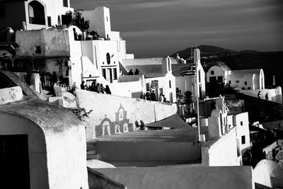 View of buildings in town against sky