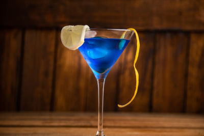 Close-up of wine glass on table