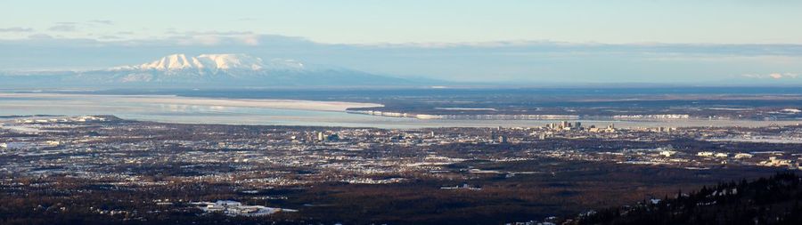 Aerial view of cityscape against sky