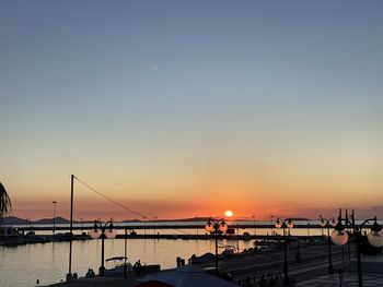 Silhouette of marina at sunset