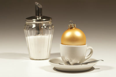Close-up of tea cup on table